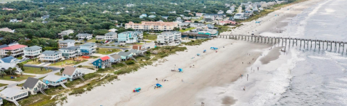 Aerial view of Oak Island, NC oceanfront homes along the coastline